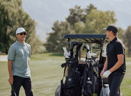 two men golfing in bamboo polos