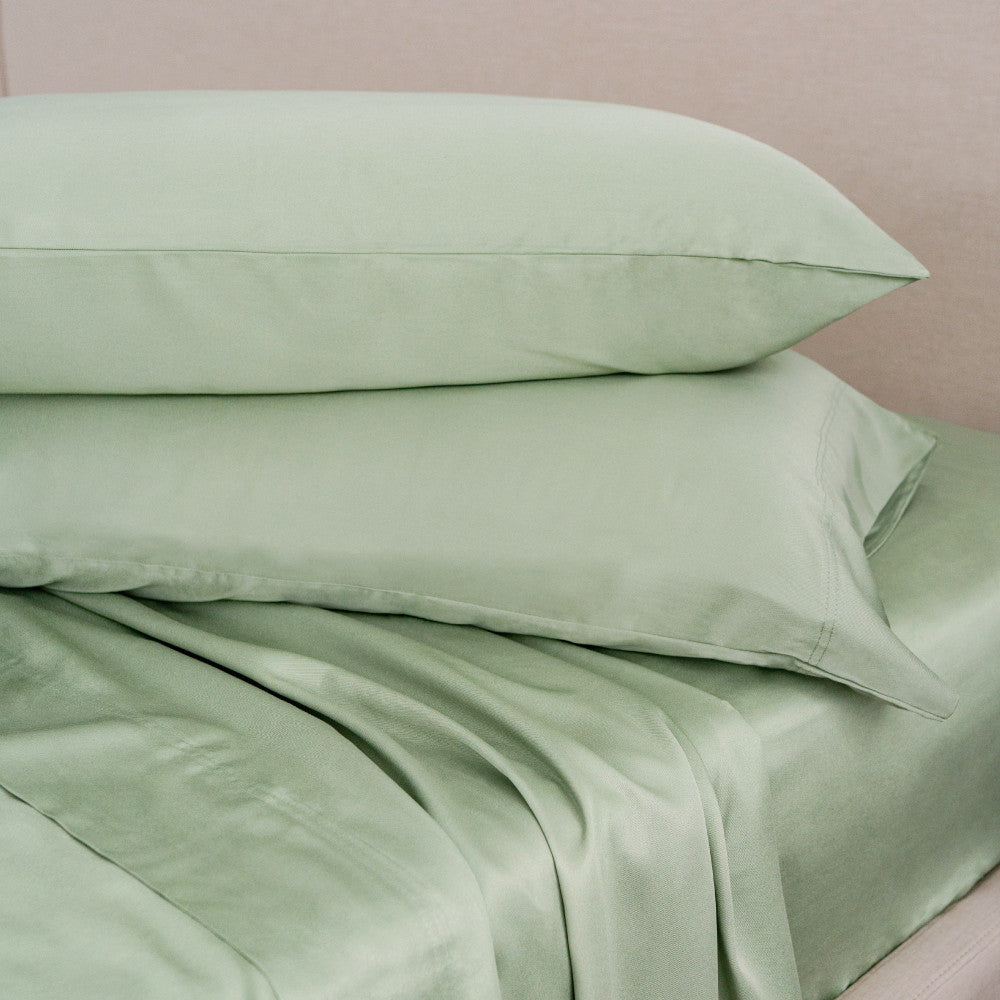sage classic pillowcases on pillows~Sage