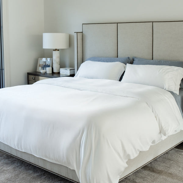 bed made with white sateen duvet cover
