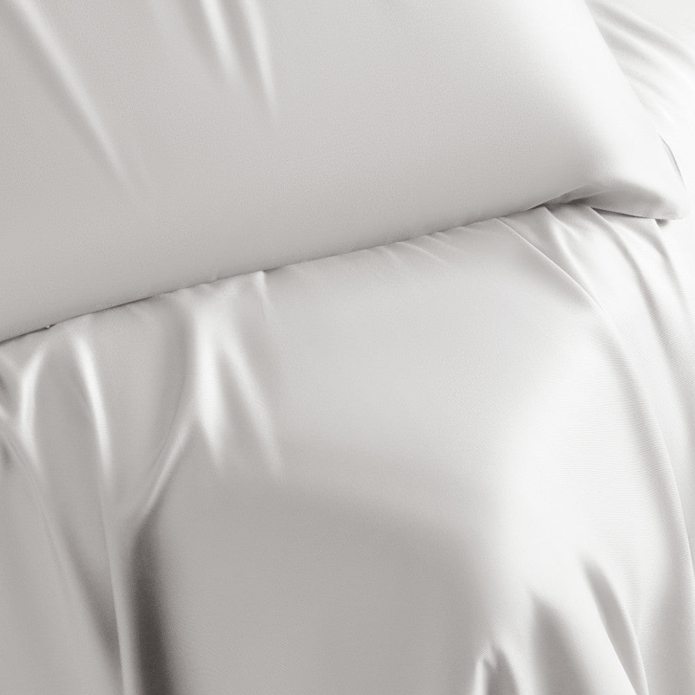 close-up on white pillowcases~White