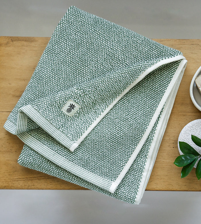 folded view oasis green bath towel