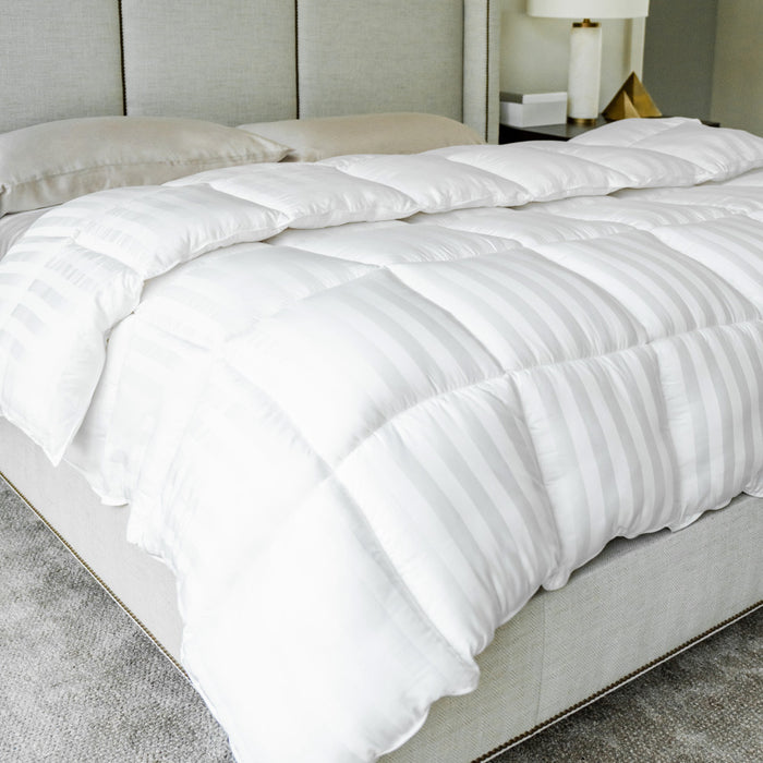 comforter laying flat on a bed