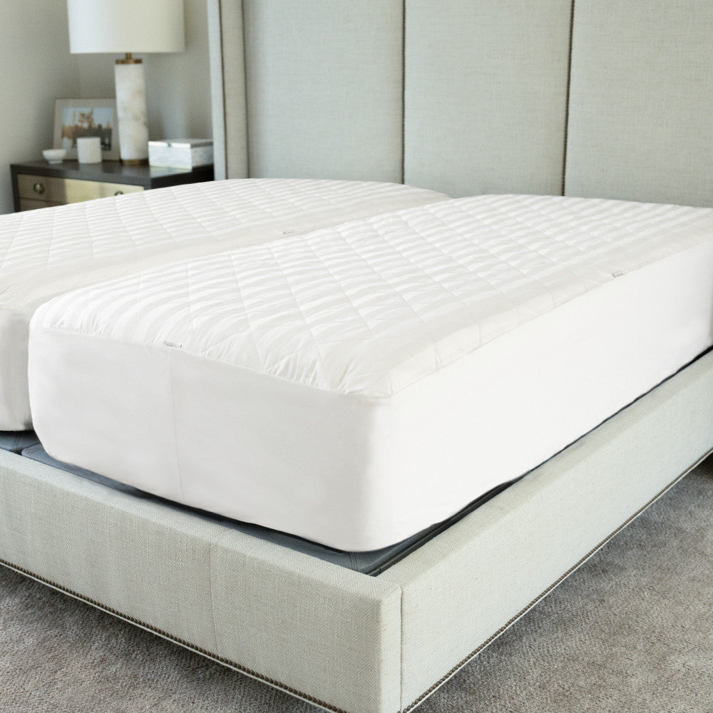 bed made with mattress protector