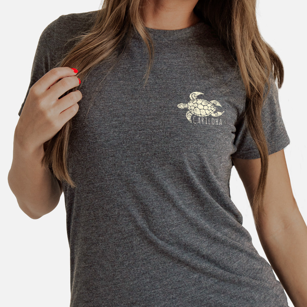 close-up on left chest floral sea turtle design