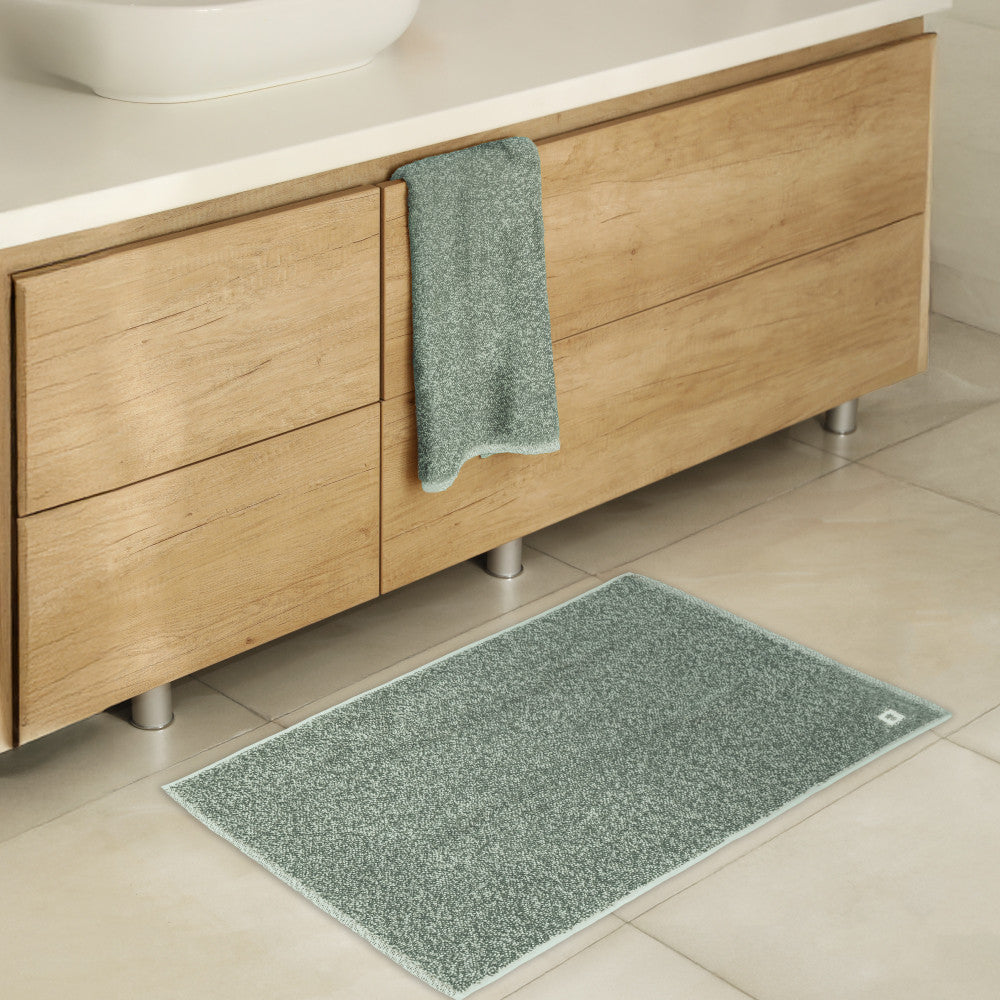 ocean green bath mat on the floor in a modern bathroom ~Oasis Green