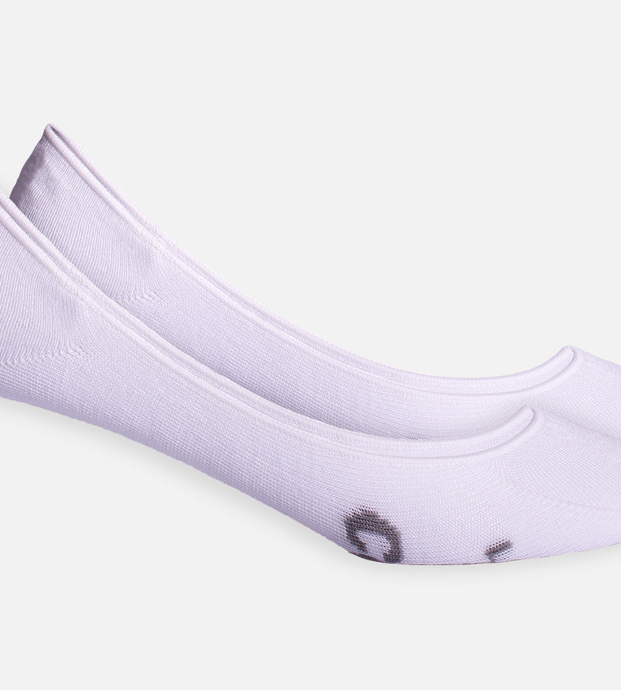close-up on white no show socks showing the ankle stitching~White