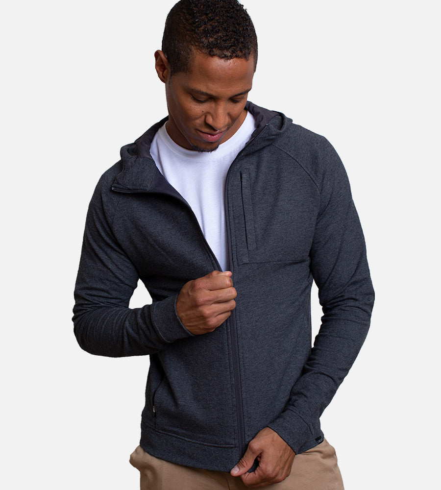 front view of model wearing charcoal zip hoodie~Charcoal Heather