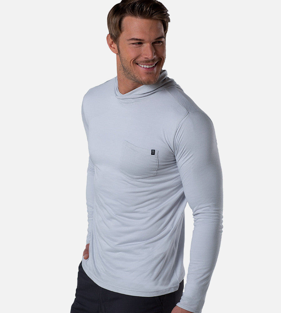 front view of model wearing gray crossover hoodie~Gray