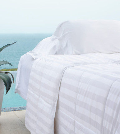 corner of bed with bamboo comforter