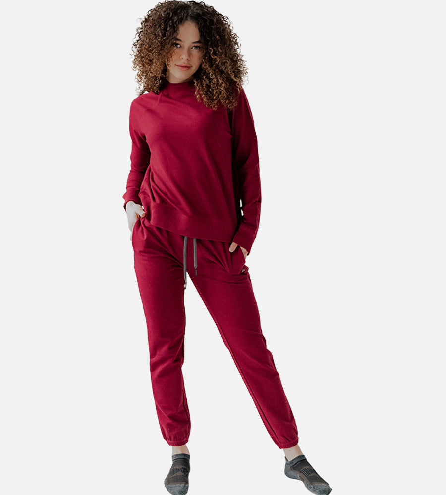 front view of model wearing Pomegranate joggers
