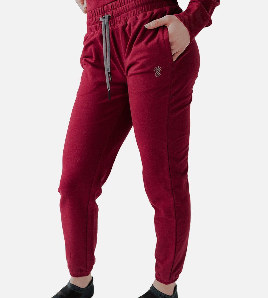front side view of models legs wearing Pomegranate joggers~Pomegranate