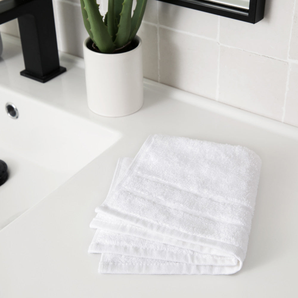 folded white washcloth~White