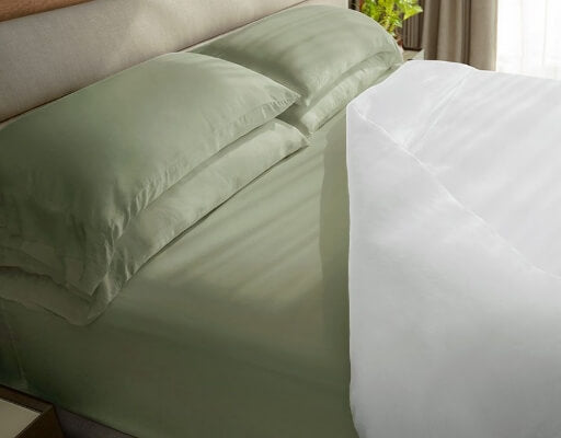 Classic sheets on bed