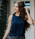 front view of model wearing midnight navy sleep tank