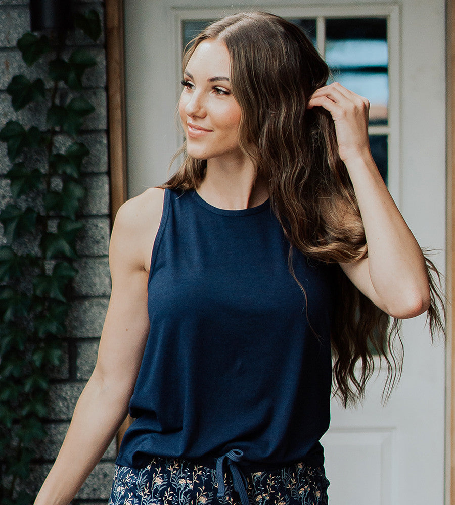 front view of model wearing midnight navy sleep tank