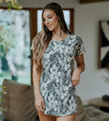 front view of model wearing soft black pineapple print sleep shirt