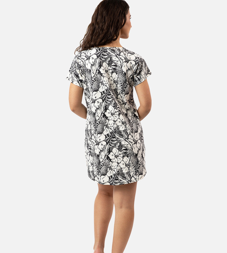 back view of model wearing soft black pineapple print sleep shirt