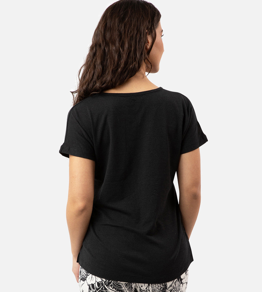 back view of model wearing soft black dolman