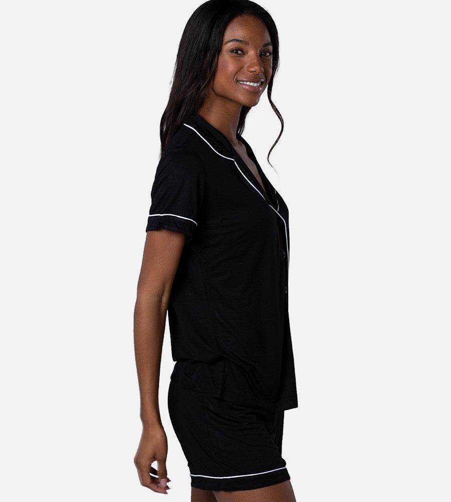 side view of model wearing black short sleep set