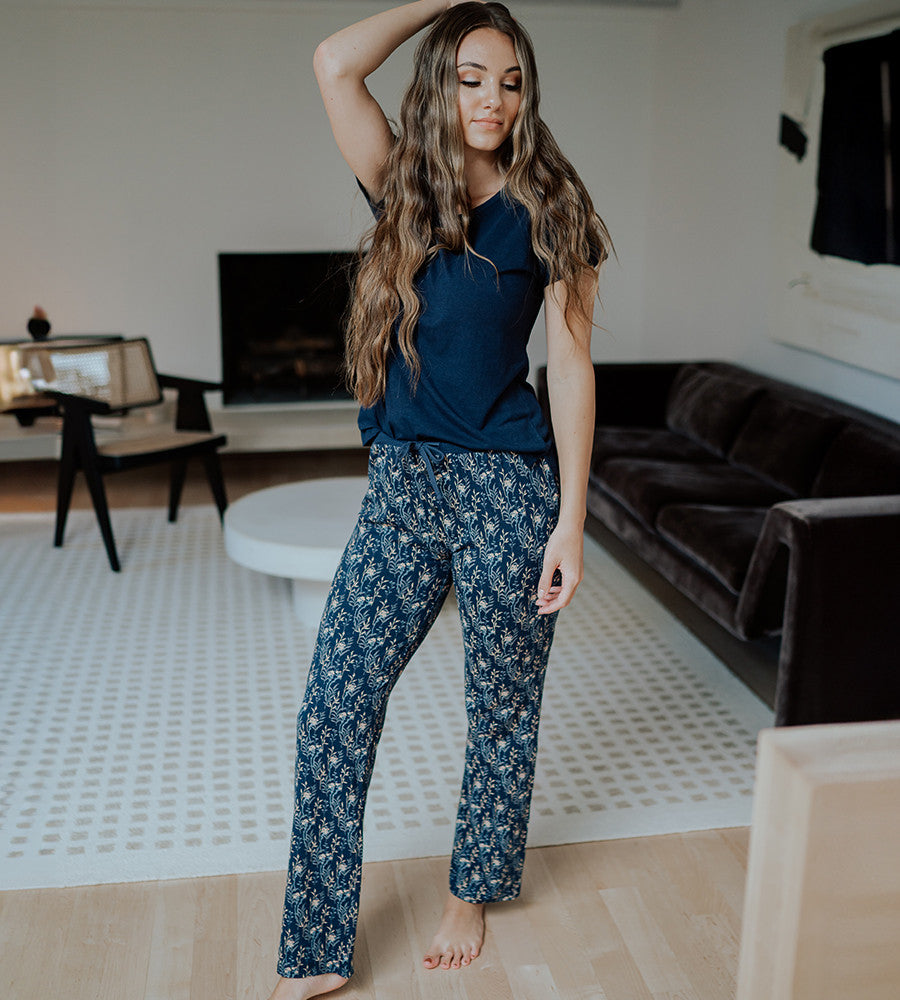 model wearing midnight floral print pants