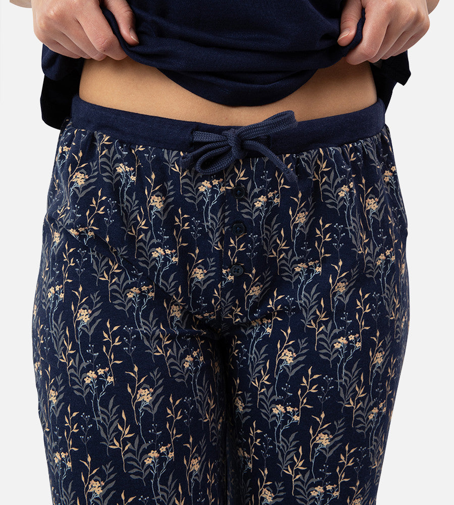 close-up on waist of midnight floral print pants