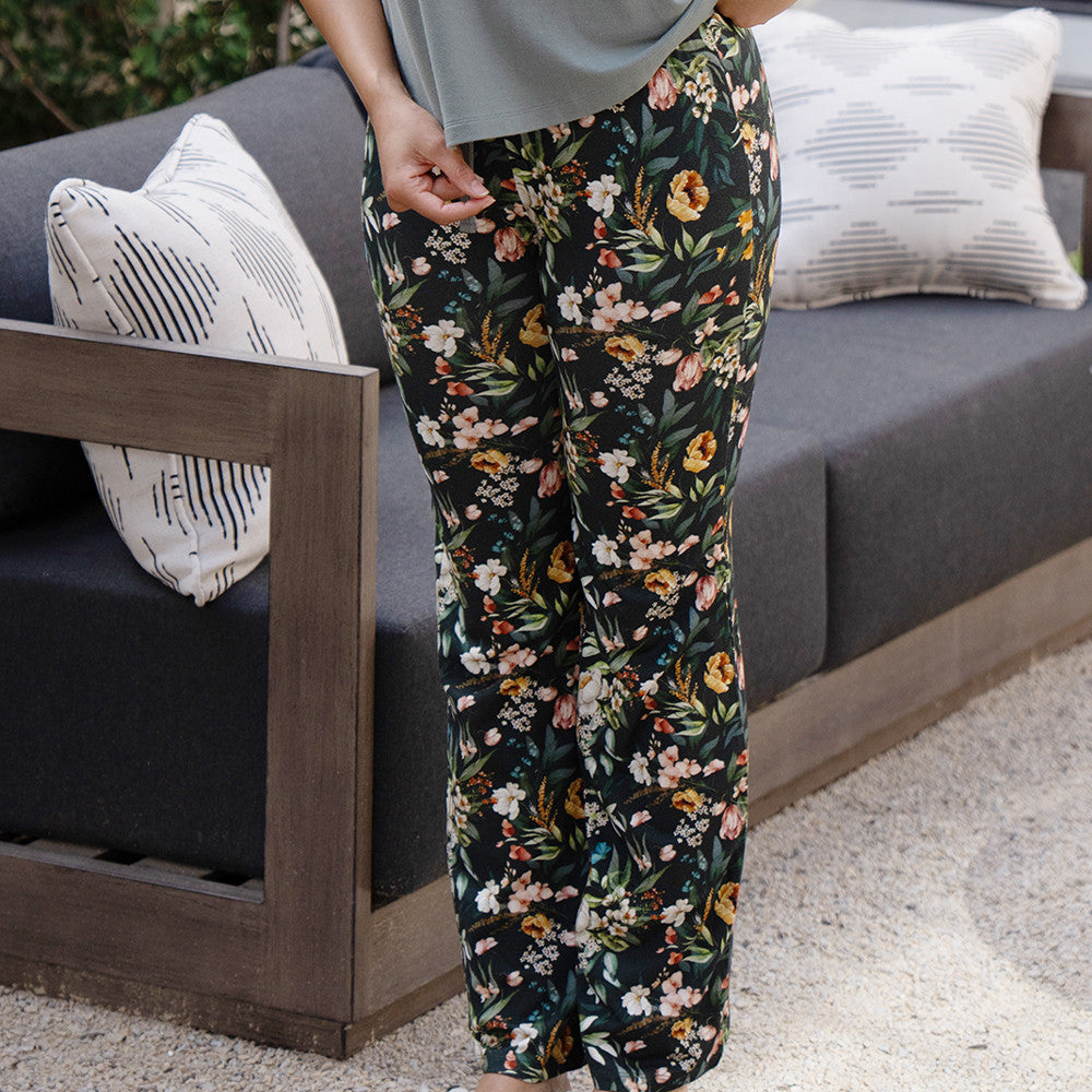 front view of models legs wearing vintage floral print sleep pants