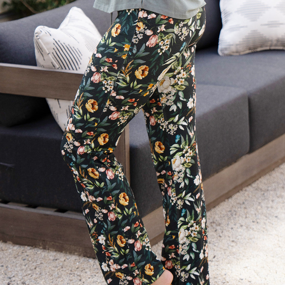 front view of models legs wearing vintage floral print sleep pants