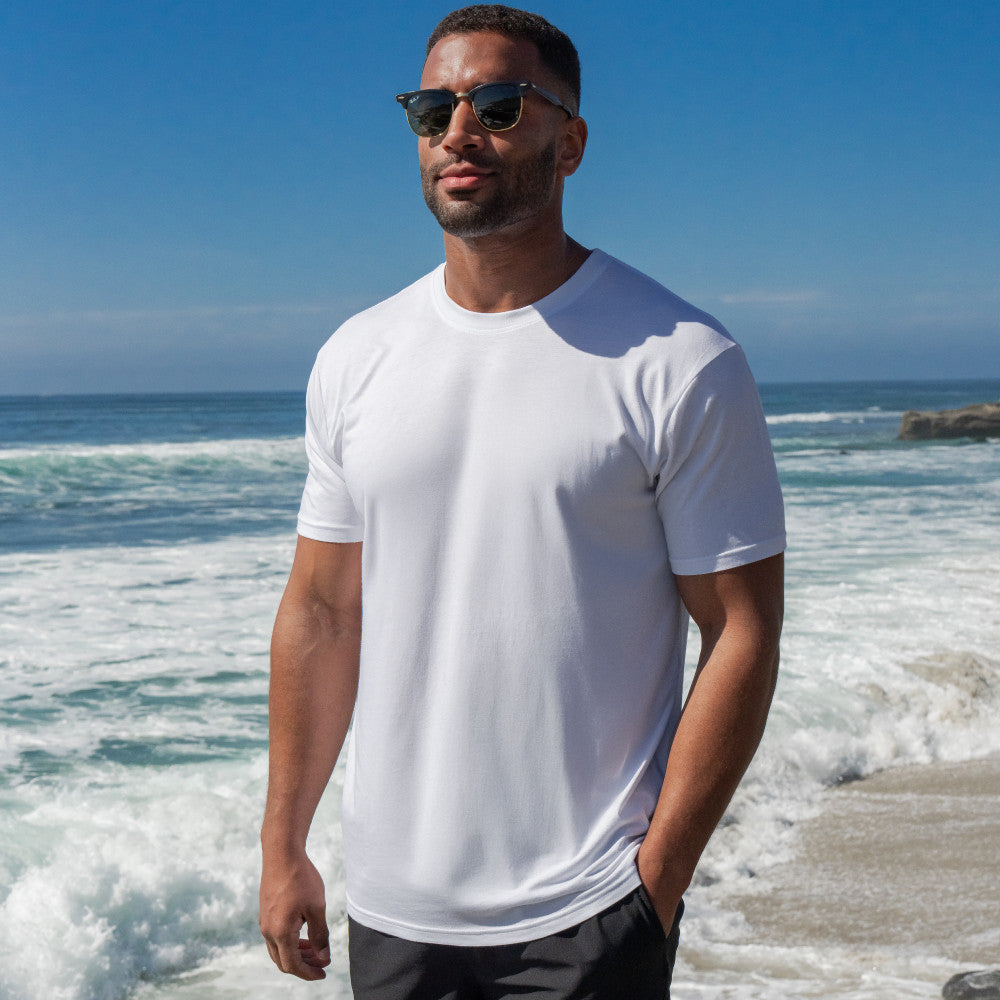 front view of model wearing white crew tee