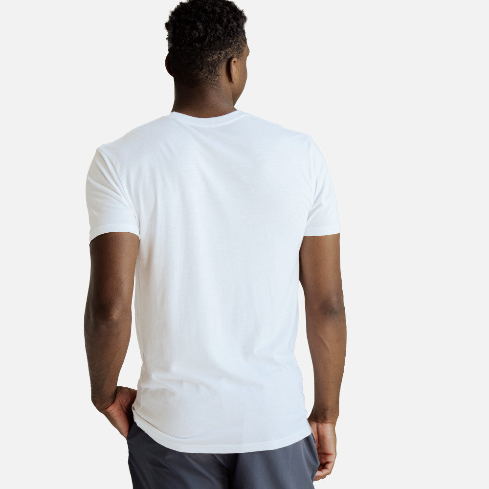 back view of model wearing white crew tee