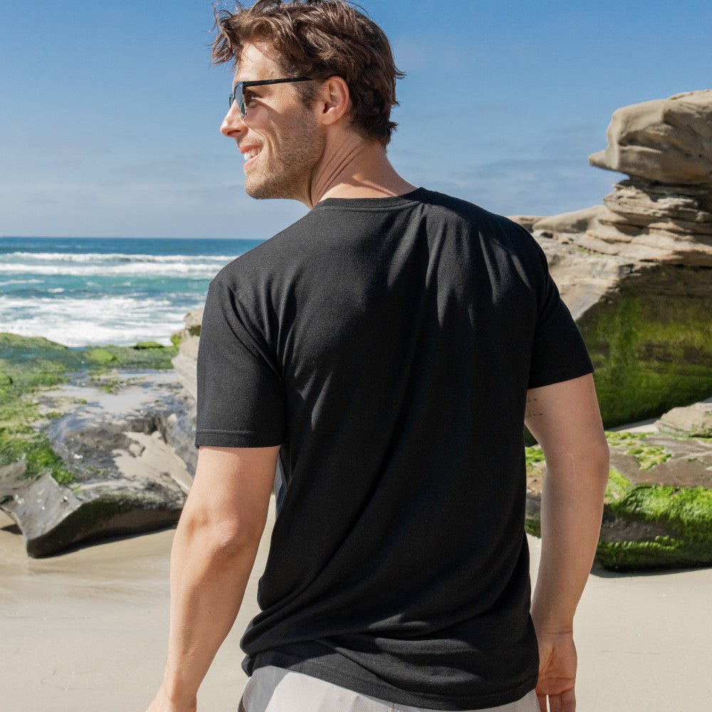 back view of model wearing black crew tee