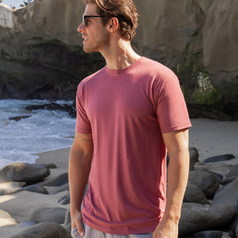 front view of model wearing hibiscus red crew tee