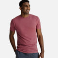 front view of model wearing hibiscus red crew tee