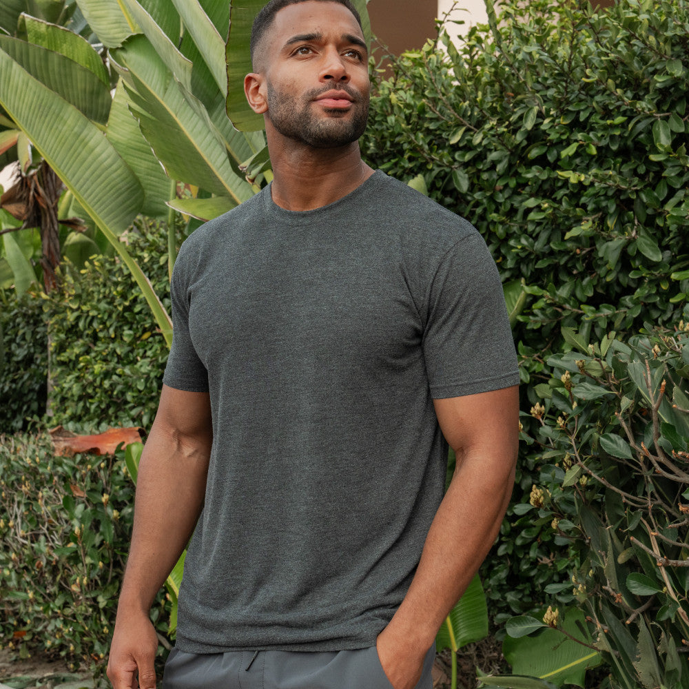 front view of model wearing charcoal heather crew tee