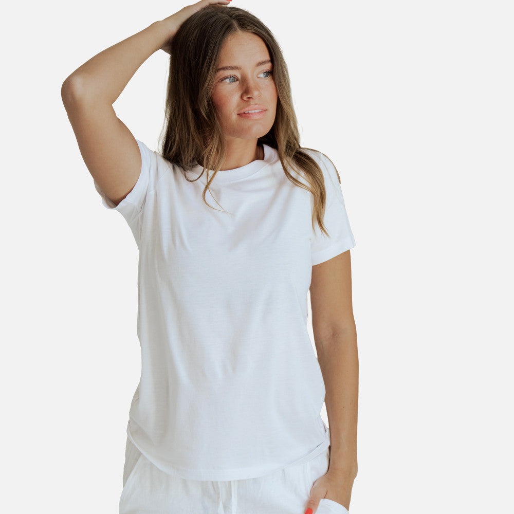 front view of model wearing white crew tee