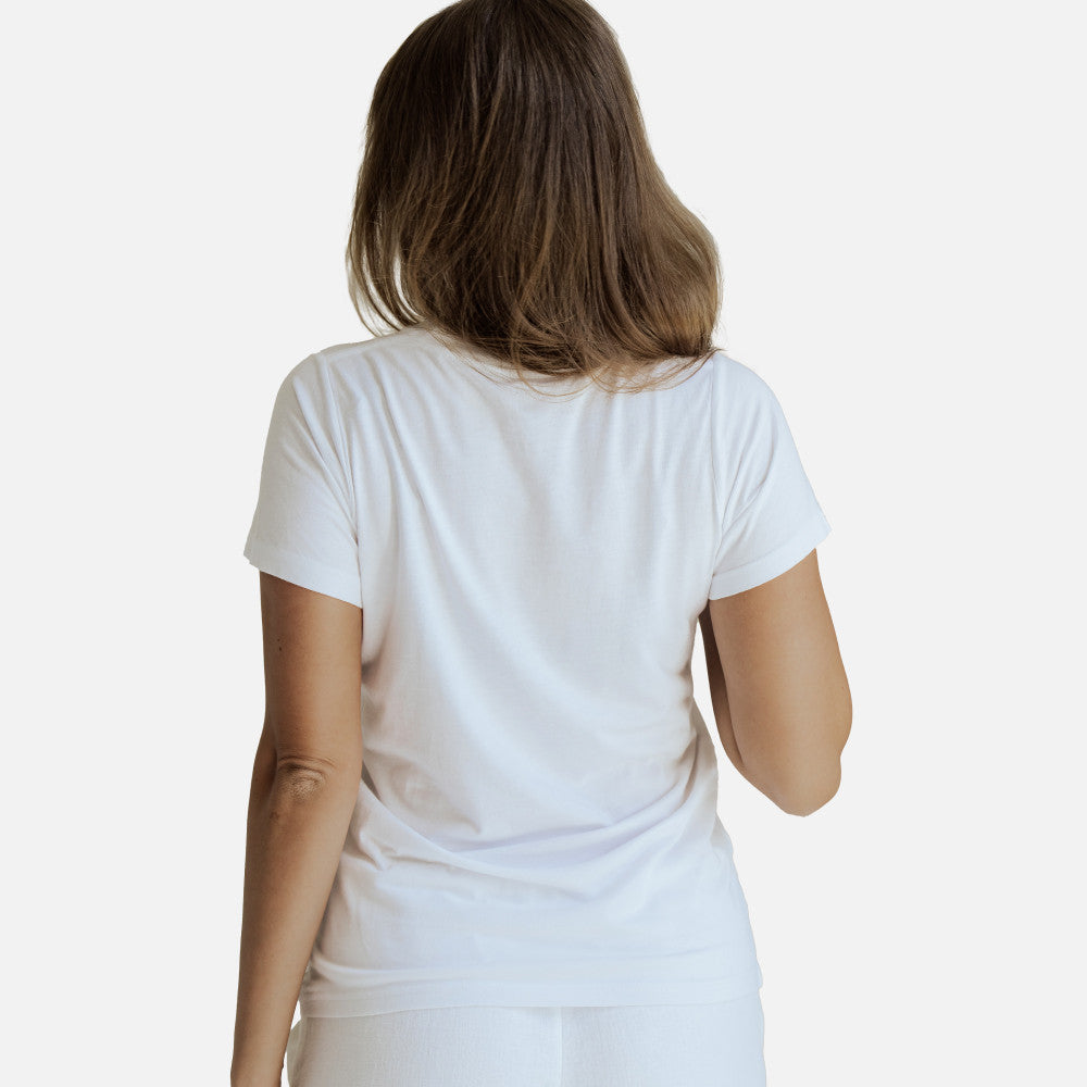 back view of model wearing white crew tee