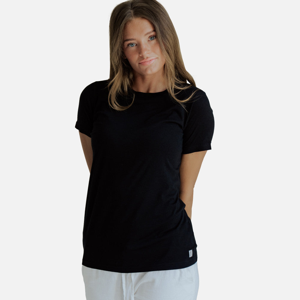 front view of model wearing black crew tee