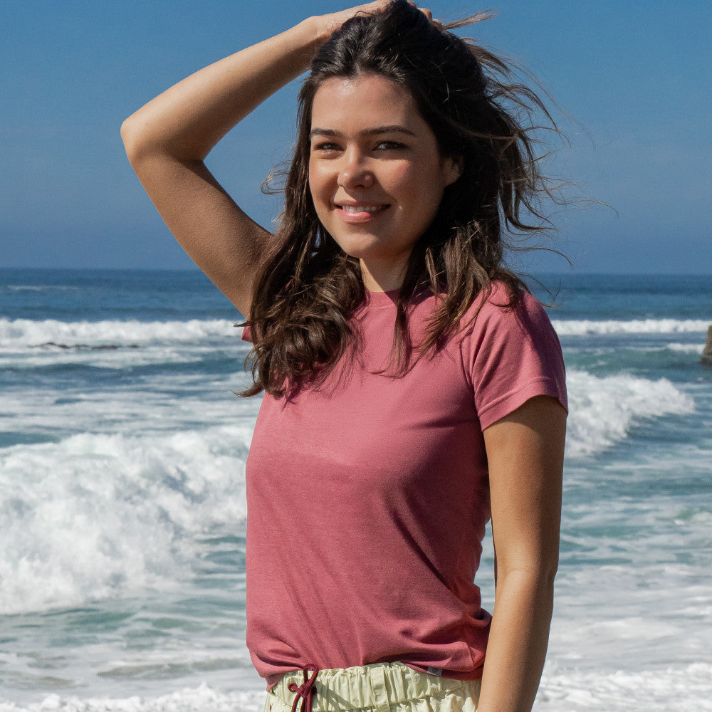 front view of model wearing hibiscus red crew tee