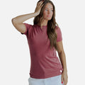 front view of model wearing hibiscus red crew tee