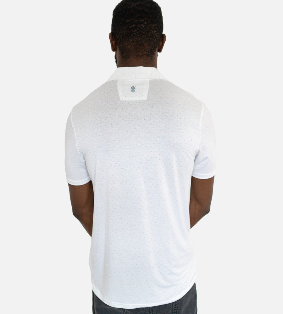 back view of model wearing dot light blue comfort polo~Dot White/Light Blue