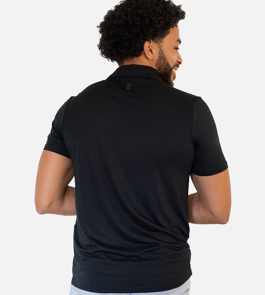 back view of model wearing back comfort polo~Black