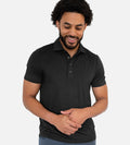 front view of model wearing charcoal comfort polo~Charcoal