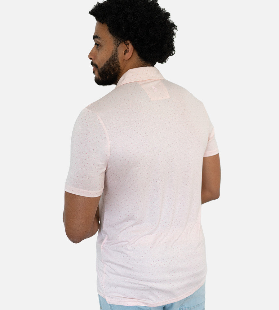 back view of model wearing dot light pink comfort polo~Dot Light Pink