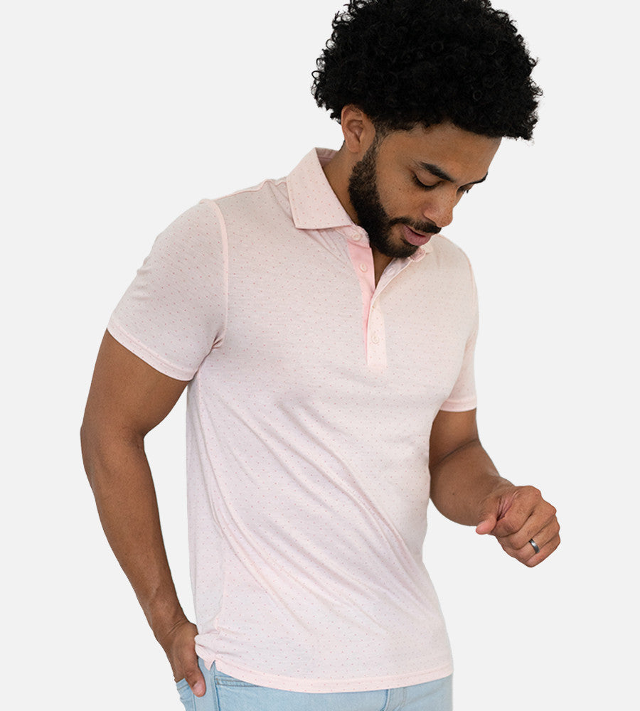 front view of model wearing dot light pink comfort polo~Dot Light Pink