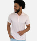 front view of model wearing dot light pink comfort polo~Dot Light Pink