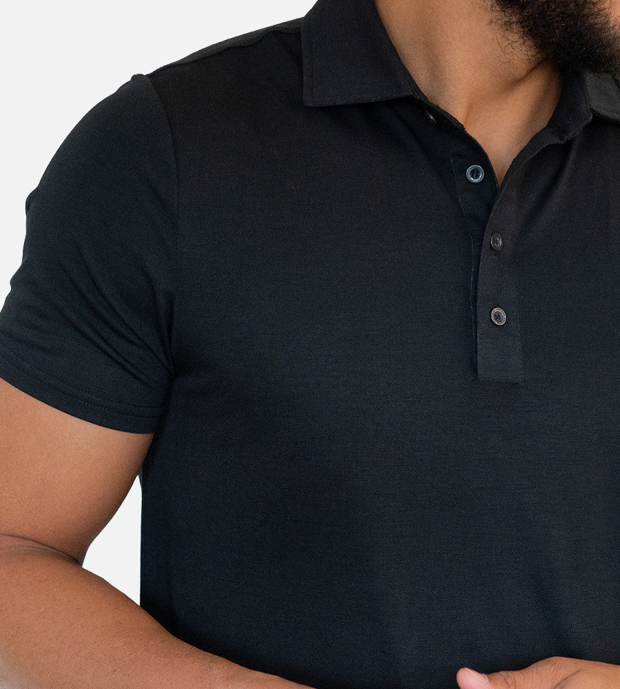 close-up on chest of black comfort polo~Black