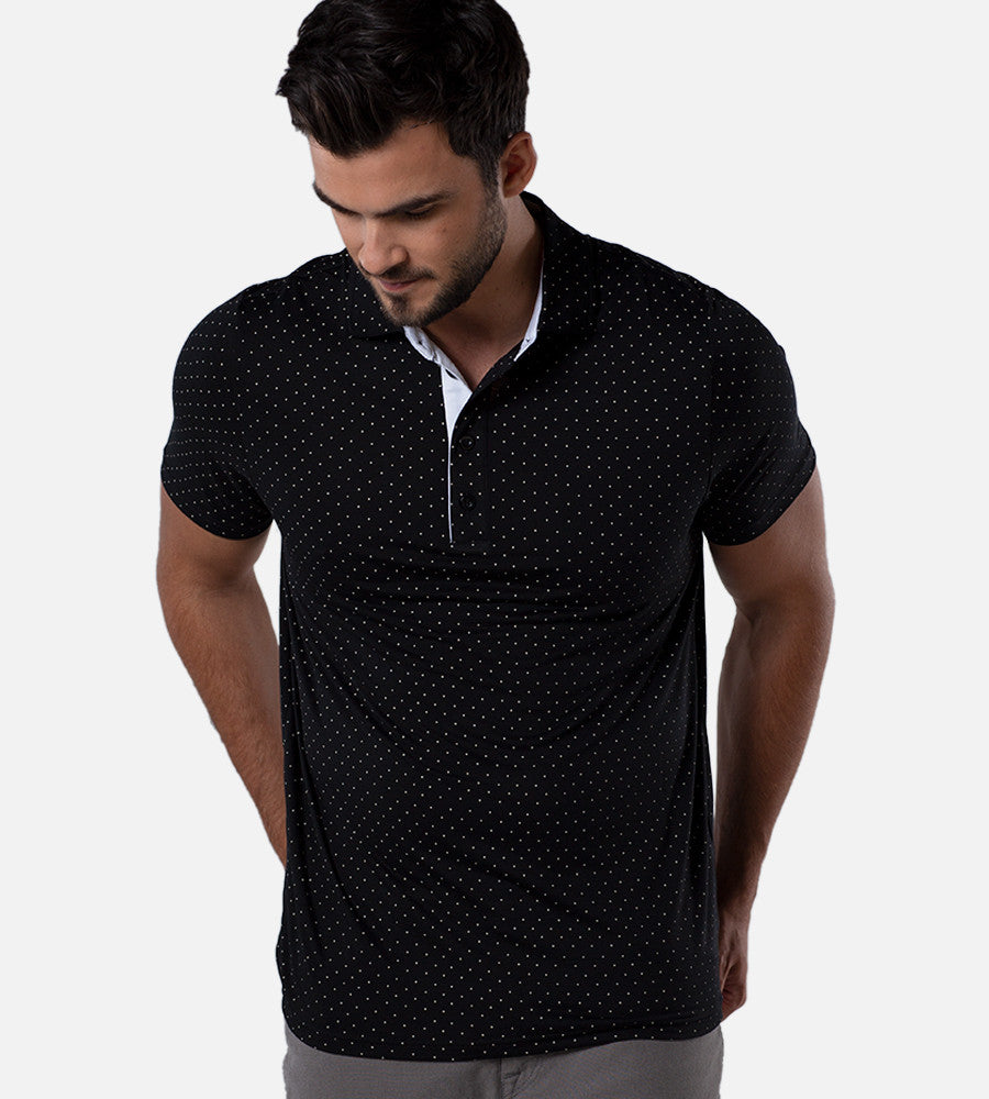 front view of model wearing dot black/white comfort polo~Dot Black/White