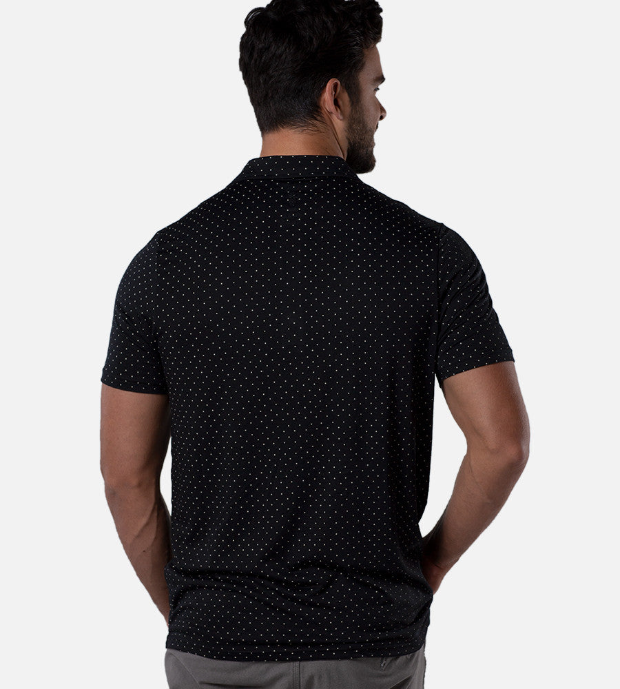 back  view of model wearing dot black/white comfort polo~Dot Black/White
