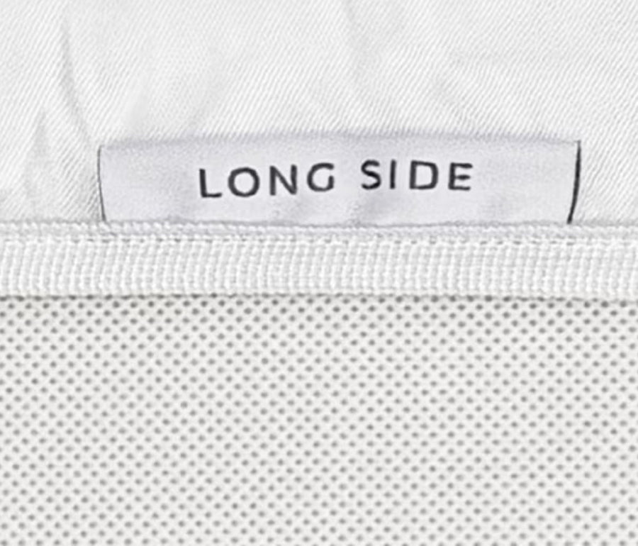 Orientation label on the Retreat fitted sheet indicating the long side
