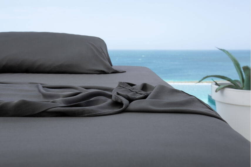 Gray bamboo sheets on a bed